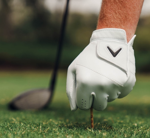 Golfer Wearing Tour Authentic Glove